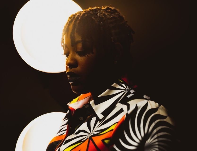 Aryiel Everett photographed against studio lights